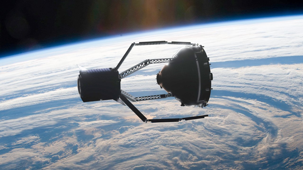 A rendering of how the ClearSpace-1 mission will grapple a discarded payload adapter with its four-arm claw. © ClearSpace SA/European Space Agency